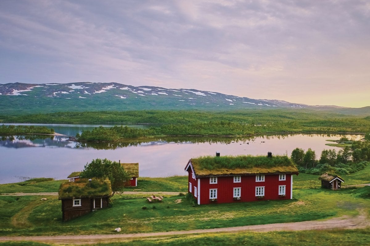 Cabin by the lake and mountain in Sweden.